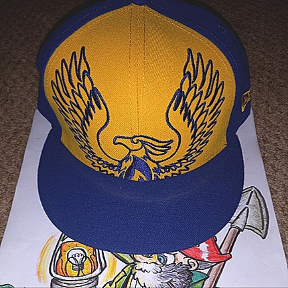 Yellow and Dark Blue Atlanta New Era's, size 7 3/8"